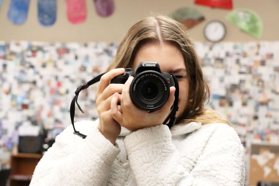 student taking a picture